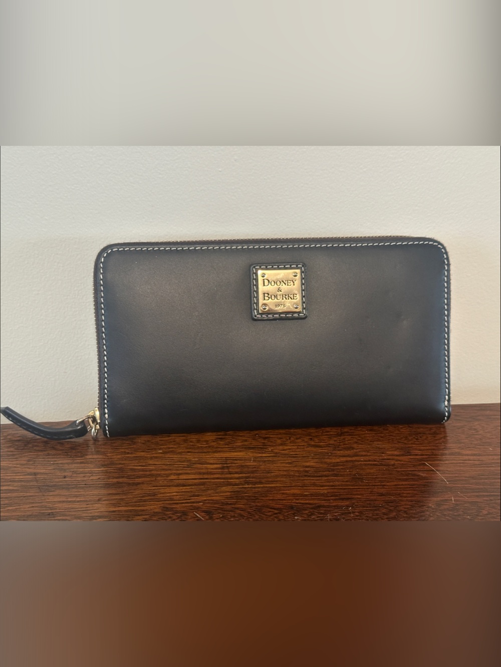 Dooney & Bourke Black Leather Zip-Around Wallet with Gold Logo